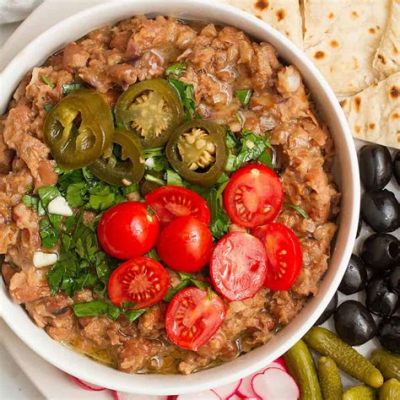  Ful Medames: Spiczste Zapachy Orientu Mieszane z Kremową Aksamitnością Ziaren Fasoli!